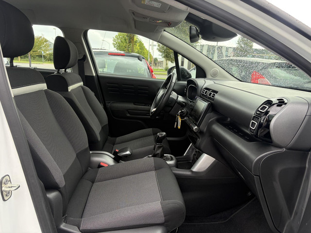 Foto 10 van Citroen C3 Aircross 1.2 PureTech Feel ✓1e Eigenaar✓Nieuwe D-riem✓Draadloze telefoonlader✓Carplay✓Nav