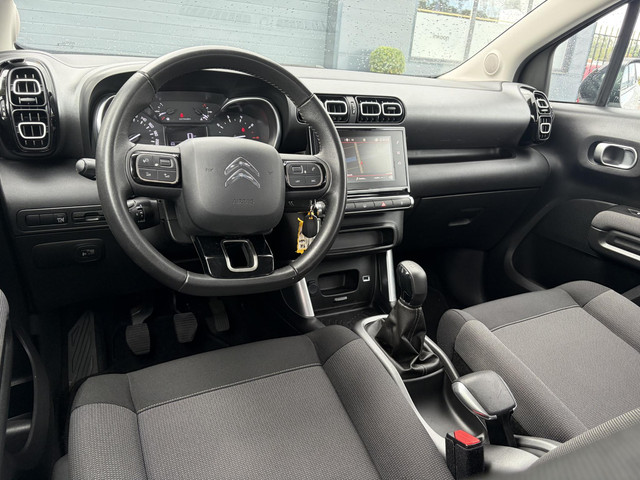 Foto 11 van Citroen C3 Aircross 1.2 PureTech Feel ✓1e Eigenaar✓Nieuwe D-riem✓Draadloze telefoonlader✓Carplay✓Nav