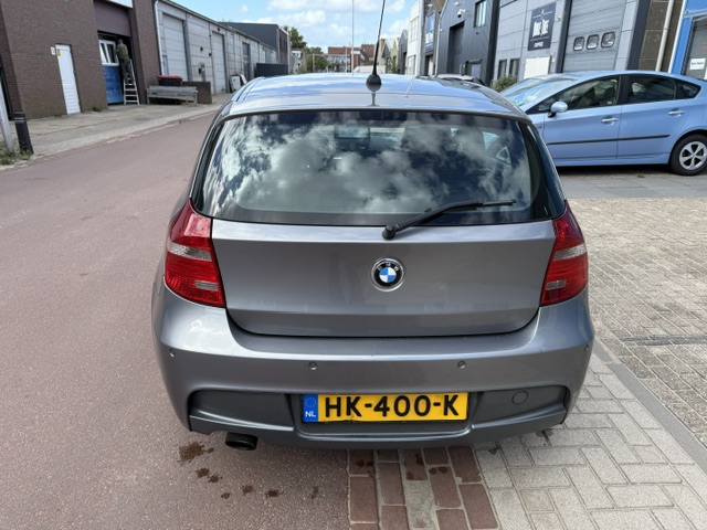 Foto 5 van BMW 1-serie 116i Corporate bj. 2009 met koude airco en nwe APK Rijdt en schakelt prima. Olielampje b