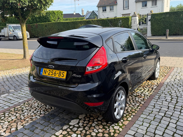 Foto 3 van Ford Fiesta 1.25 Titanium Airco PDC 5-drs Zwart