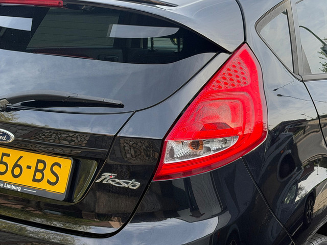 Foto 5 van Ford Fiesta 1.25 Titanium Airco PDC 5-drs Zwart