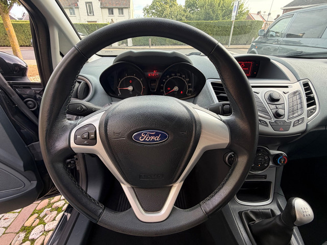 Foto 7 van Ford Fiesta 1.25 Titanium Airco PDC 5-drs Zwart