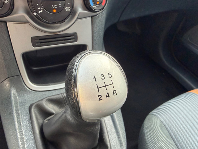 Foto 10 van Ford Fiesta 1.25 Titanium Airco PDC 5-drs Zwart