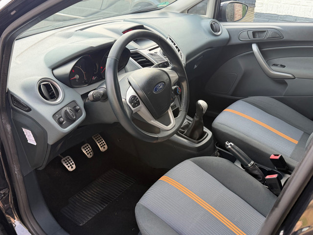 Foto 2 van Ford Fiesta 1.25 Titanium Airco PDC 5-drs Zwart