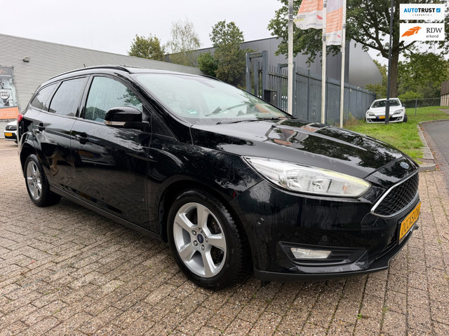 Foto 6 van Ford Focus Wagon 1.0 EcoBoost Titanium Business 1e eigenaar, 67.520 km, cruise, clima, stoel en stuu