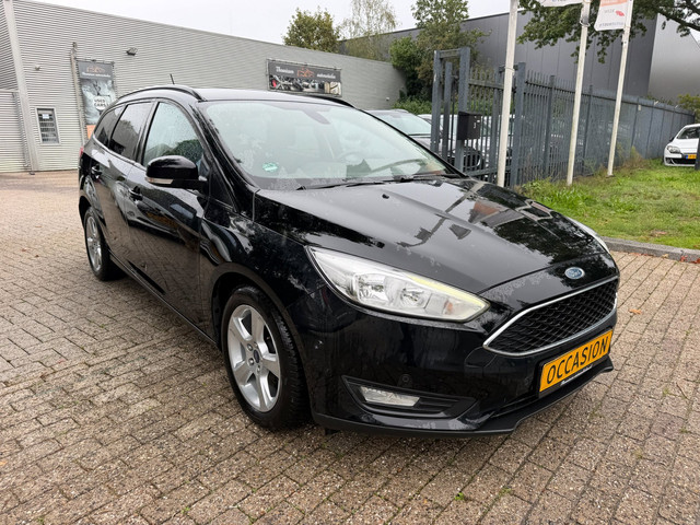 Foto 10 van Ford Focus Wagon 1.0 EcoBoost Titanium Business 1e eigenaar, 67.520 km, cruise, clima, stoel en stuu