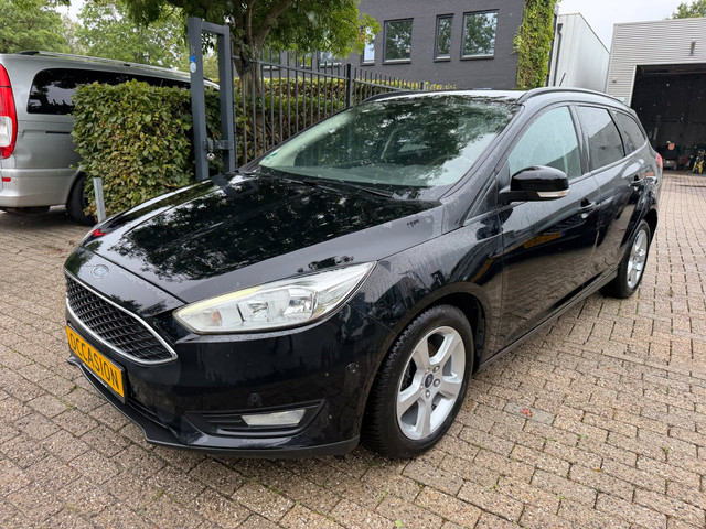 Foto 4 van Ford Focus Wagon 1.0 EcoBoost Titanium Business 1e eigenaar, 67.520 km, cruise, clima, stoel en stuu