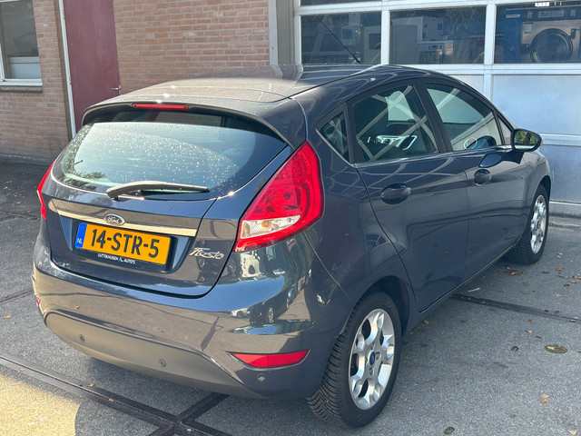 Foto 2 van Ford Fiesta 1.25 Titanium,Climat,Cruise,LMV,5 Drs