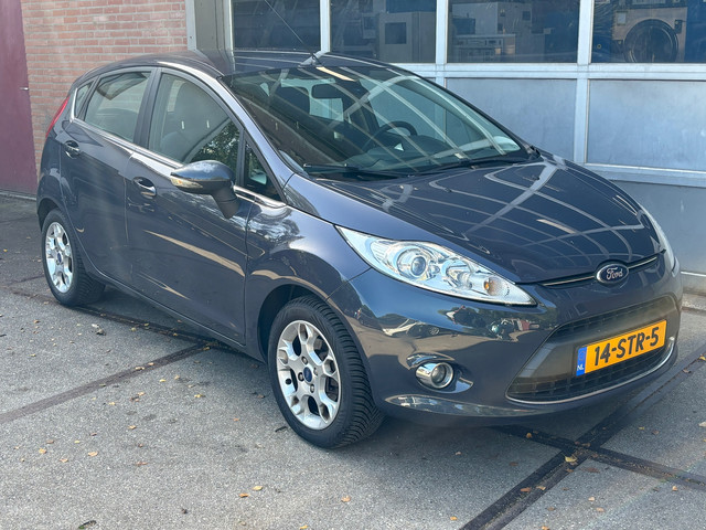 Foto 6 van Ford Fiesta 1.25 Titanium,Climat,Cruise,LMV,5 Drs