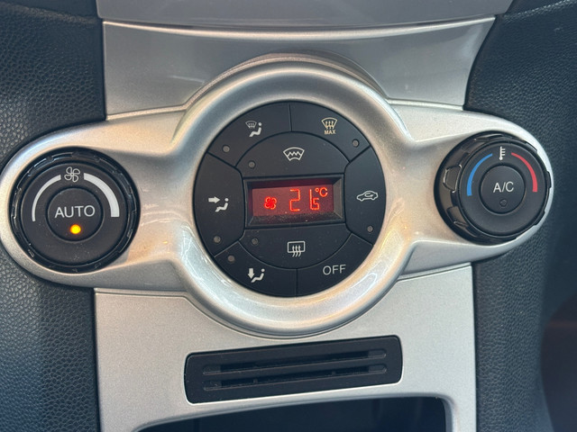 Foto 8 van Ford Fiesta 1.25 Titanium,Climat,Cruise,LMV,5 Drs