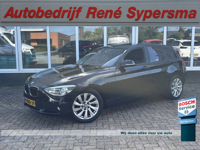 BMW 1-serie 114i EDE | Stoelverwarming | Leder | Bluetooth | Navi | Cruise