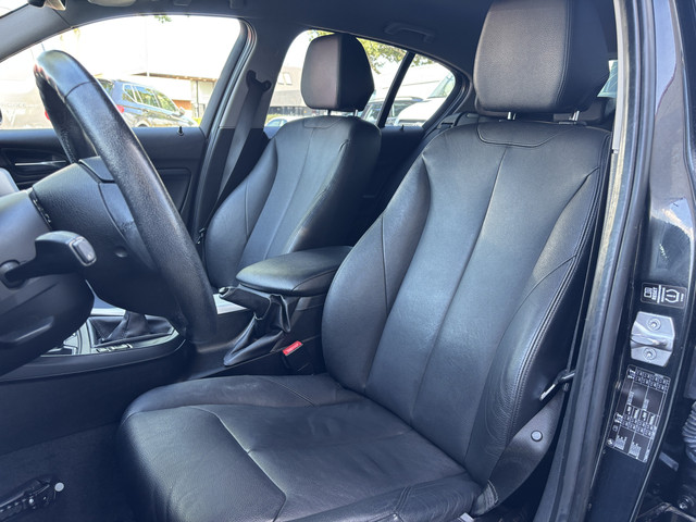 Foto 2 van BMW 1-serie 114i EDE | Stoelverwarming | Leder | Bluetooth | Navi | Cruise