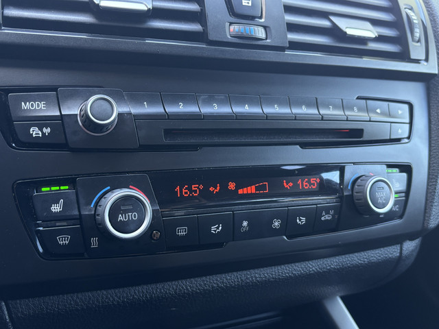 Foto 4 van BMW 1-serie 114i EDE | Stoelverwarming | Leder | Bluetooth | Navi | Cruise