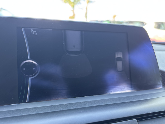 Foto 6 van BMW 1-serie 114i EDE | Stoelverwarming | Leder | Bluetooth | Navi | Cruise