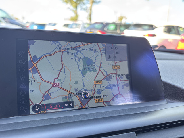 Foto 10 van BMW 1-serie 114i EDE | Stoelverwarming | Leder | Bluetooth | Navi | Cruise