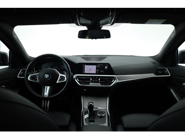 Foto 7 van BMW 3 Serie Touring 320i M Sport | Rijklaar! | Dig. Cockpit | Stoelverw. | Adapt. Cruise | PDC | Nav