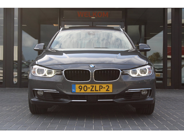 Foto 9 van BMW 3-serie Touring 328i High Executive, H/K, Leder, Pano, Adaptive Cruise Control, Verwarmde achter