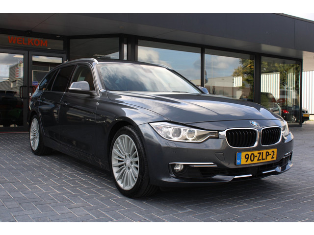 Foto 8 van BMW 3-serie Touring 328i High Executive, H/K, Leder, Pano, Adaptive Cruise Control, Verwarmde achter