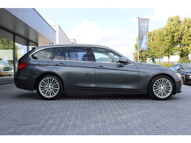 Foto 4 van BMW 3-serie Touring 328i High Executive, H/K, Leder, Pano, Adaptive Cruise Control, Verwarmde achter