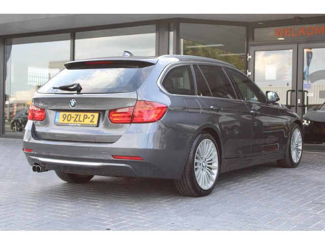 Foto 3 van BMW 3-serie Touring 328i High Executive, H/K, Leder, Pano, Adaptive Cruise Control, Verwarmde achter