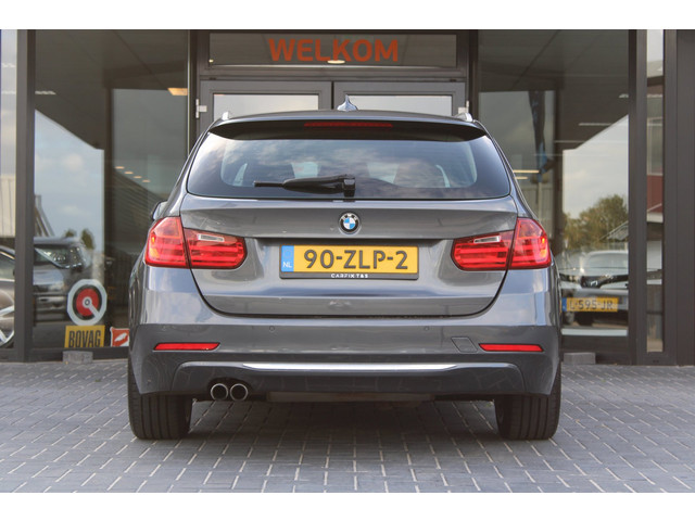 Foto 2 van BMW 3-serie Touring 328i High Executive, H/K, Leder, Pano, Adaptive Cruise Control, Verwarmde achter