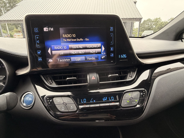 Foto 3 van Toyota C-HR 1.8 Hybrid Dynamic | LED | Trekhaak | Camera | Stoelverwarming | All-seasons | Navi | Ke