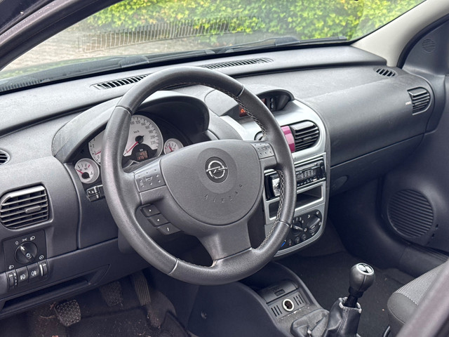 Foto 5 van Opel Corsa 1.2-16V Silverline | Airco | APK 09-07-2027 | Elektrische ramen en spiegels | LM velgen |