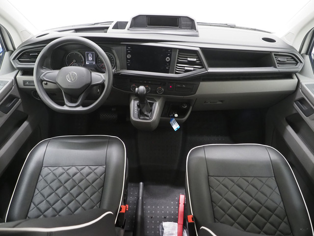 Foto 9 van Volkswagen California 2.0 TDI T6.1 4Motion DSG All Terrain | Slaaphefdak | Draaistoelen | Koelkast |