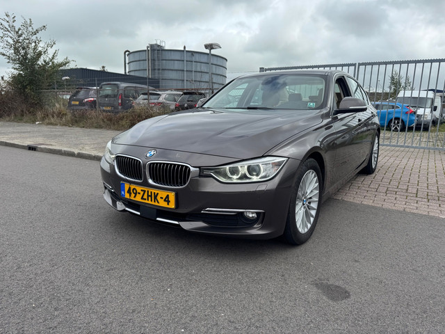 Foto 3 van BMW 3-serie 320d AUTOMAAT XENON/HEADUP/NAVI/CLIMA