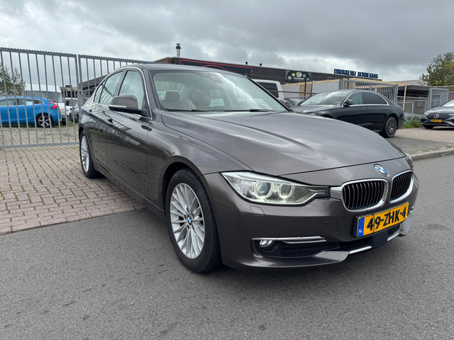 Foto 2 van BMW 3-serie 320d AUTOMAAT XENON/HEADUP/NAVI/CLIMA