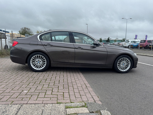 Foto 4 van BMW 3-serie 320d AUTOMAAT XENON/HEADUP/NAVI/CLIMA