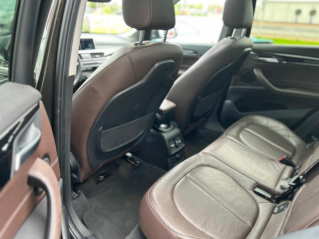 Foto 5 van BMW X1 sDrive20i Centennial High Executive PANO|TREKHAAK|LEDER
