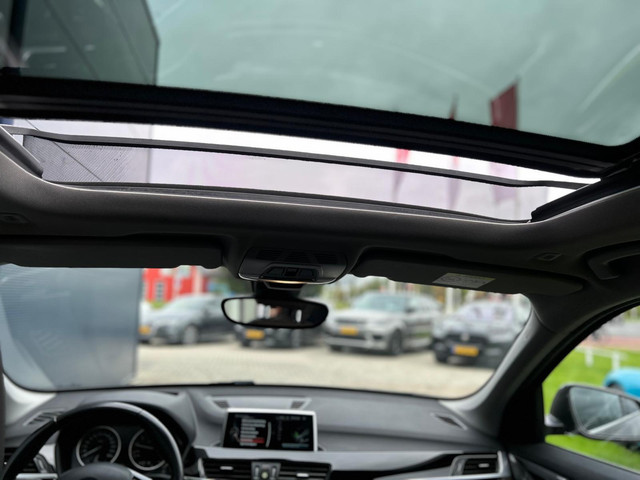 Foto 4 van BMW X1 sDrive20i Centennial High Executive PANO|TREKHAAK|LEDER