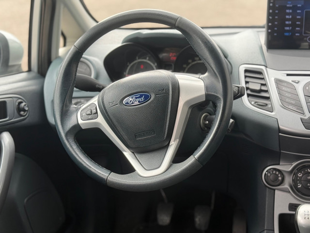 Foto 10 van Ford Fiesta 1.25 Titanium | airco | carplay