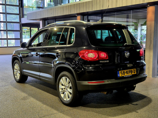 Foto 7 van Volkswagen Tiguan 1.4 TSI Sport&Style Navigatie | Sensoren | Trekhaak | Cruise | Clima