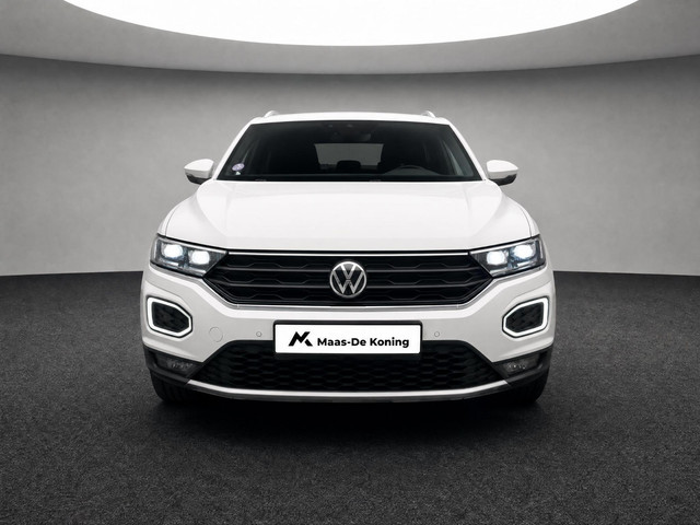 Foto 3 van Volkswagen T-Roc 1.5 TSI 150pk DSG Sport · Camera · Trekhaak · Navigatie · Stoelverwarming · 18'' In