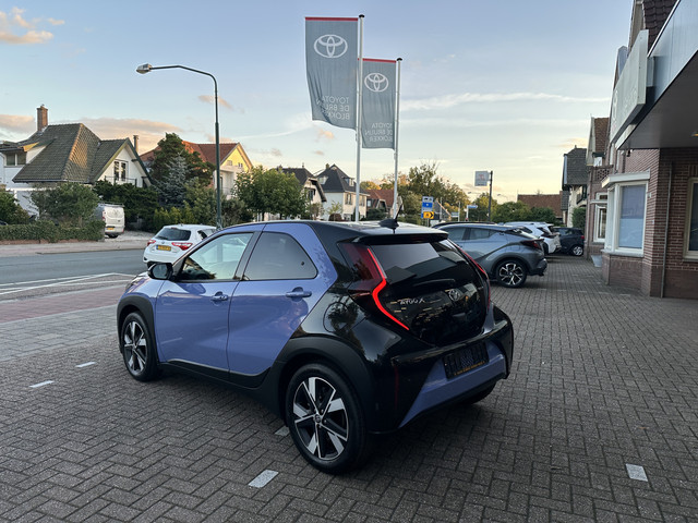 Foto 7 van Toyota Aygo X Hybrid 115 pulse stoelverwarming / keyless start / parkeersensoren voor + achter / Nav