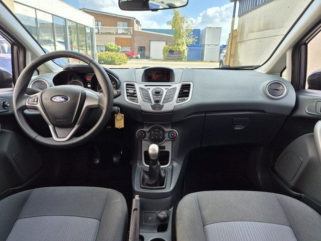 Foto 7 van Ford Fiesta 1.25 Limited|2e eig|NAP|Airco|El.Ramen|APK|AUX