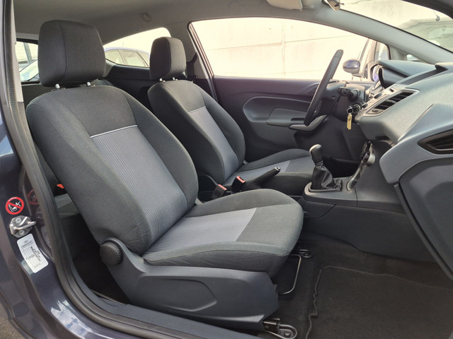 Foto 4 van Ford Fiesta 1.25 Limited|2e eig|NAP|Airco|El.Ramen|APK|AUX