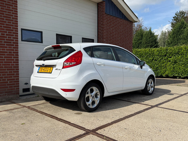 Foto 7 van Ford Fiesta 1.25 Titanium 1e Eigen PDC Cruise Contr Climate Contr