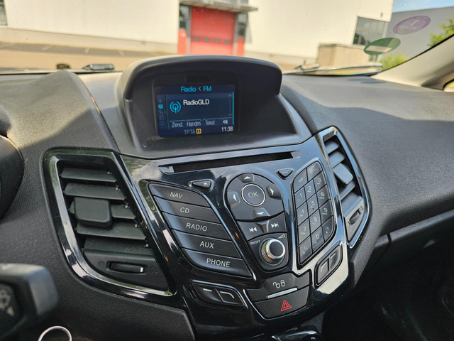 Foto 3 van Ford Fiesta 1.0 EcoBoost Titanium 5-deurs AIRCO/cruise