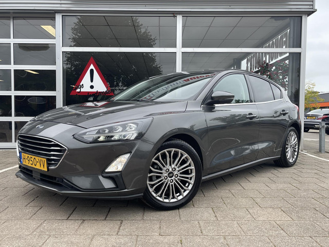Foto 4 van Ford Focus 1.0 EcoBoost Titanium Business /Cruise/Clima/Trekhaak afneembaar/Navi/2020/