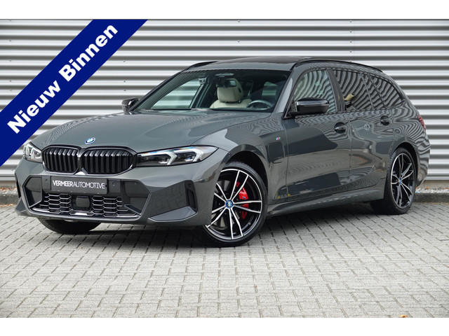 BMW 3 Serie Touring 330e M-Sport Pro | Panodak | Trekhaak | H&K | HUD | Carbon | Memory | ACC |