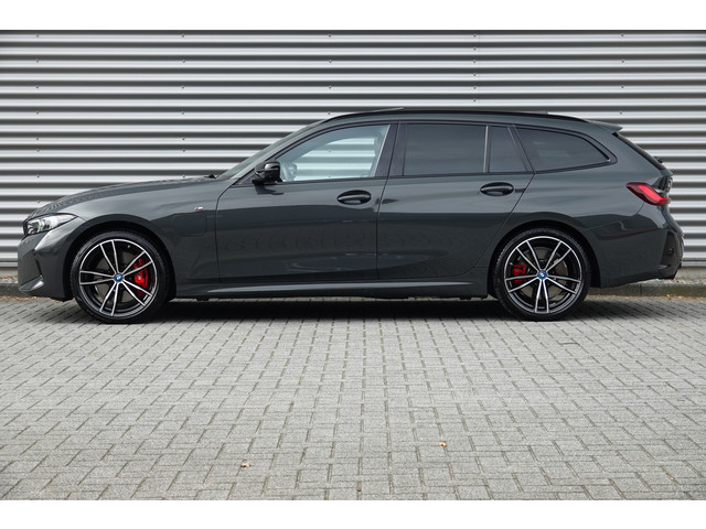 Foto 7 van BMW 3 Serie Touring 330e M-Sport Pro | Panodak | Trekhaak | H&K | HUD | Carbon | Memory | ACC |