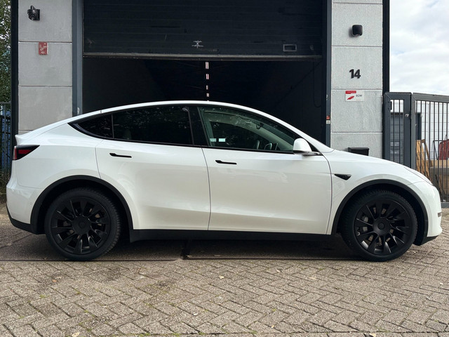 Foto 4 van Tesla Model Y Long Range AWD 75 kWh | Elektrisch | 2022 | Panoramadak | Premium Audio | Keyless | Ve
