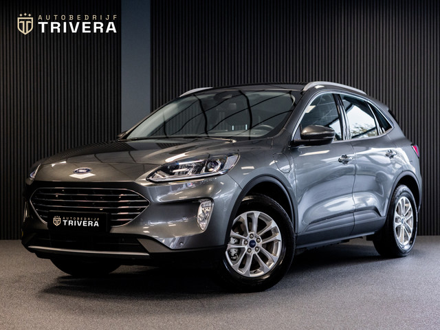 Foto 2 van Ford Kuga 2.5 PHEV Titanium l SoH 96% l CAM 360° l CARPLAY l NAV l 1ste eig.l Keyless entry l Dealer