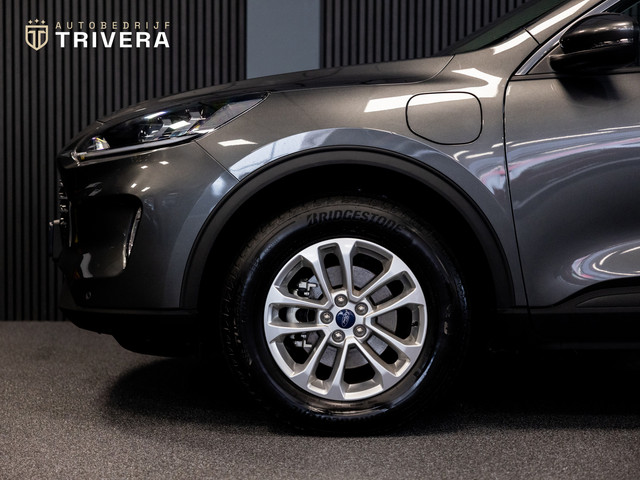 Ford Kuga 2.5 PHEV Titanium l SoH 96% l CAM 360° l CARPLAY l NAV l 1ste eig.l Keyless entry l Dealer