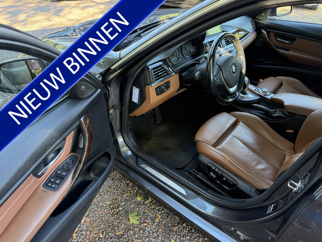 Foto 2 van BMW 3-serie 335i High Executive (bj 2012, automaat)