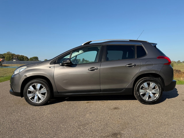 Peugeot 2008 1.2 PureTech Style / Automaat / Nieuwe distributieriem 11-2025 / Navigatie / Climate Co