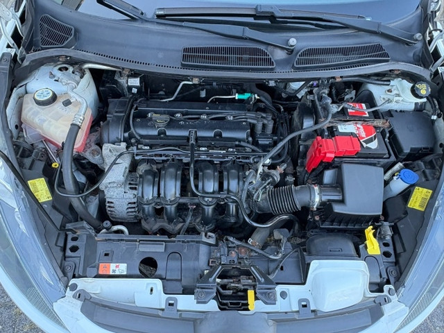 Foto 9 van Ford Fiesta 1.25 Titanium 5 Deurs Airco Cruise Control APK